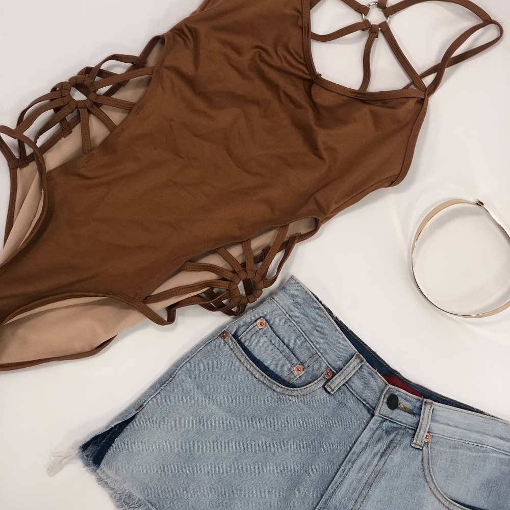 One piece swim suit with shorts
